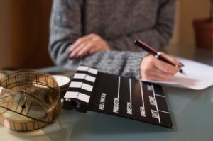 screenwriter with clapperboard