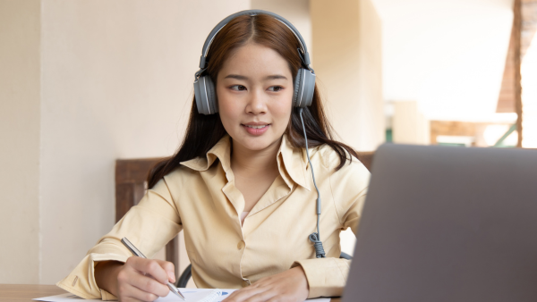 Woman working on computer.